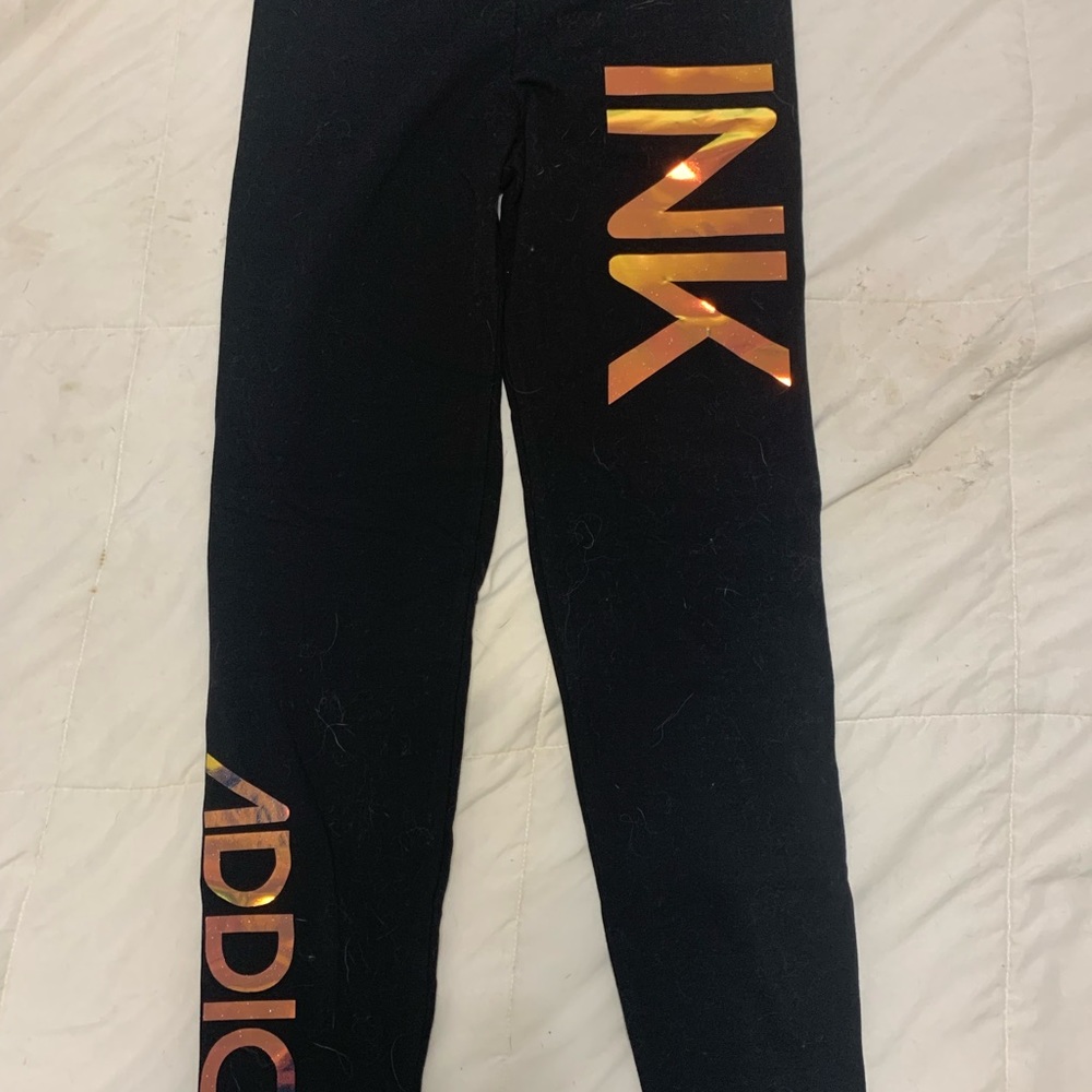 Ink addict brand leggings! RUNS SMALL